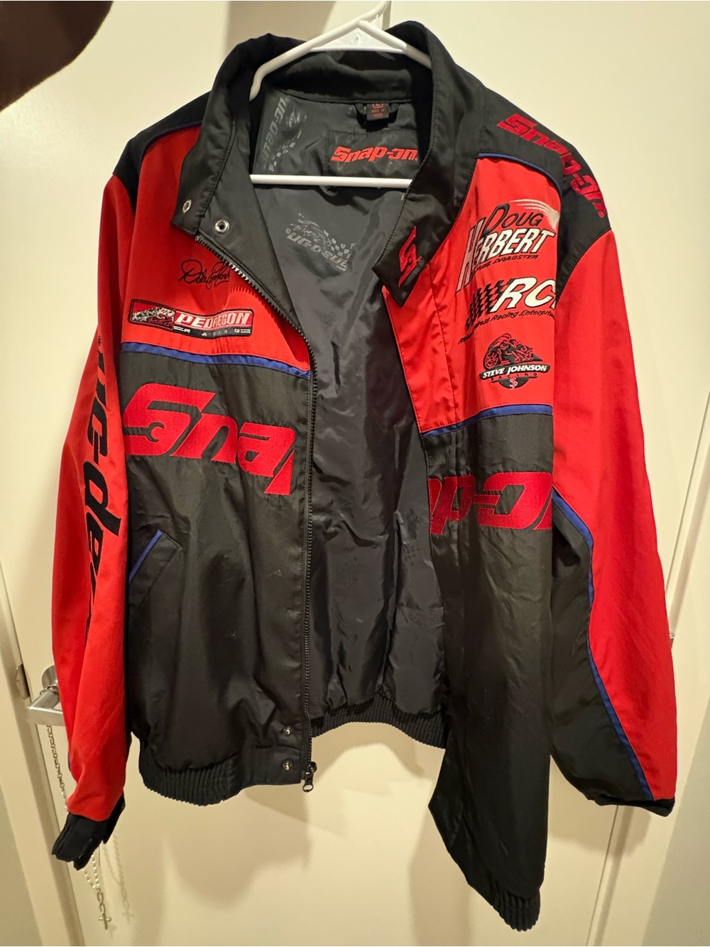 Snap black jacket with red Snap-on embroidered logo